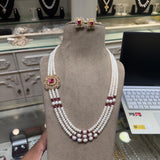 Elegance Redefined: Triple-Strand Real Pearl Set with Side Locket