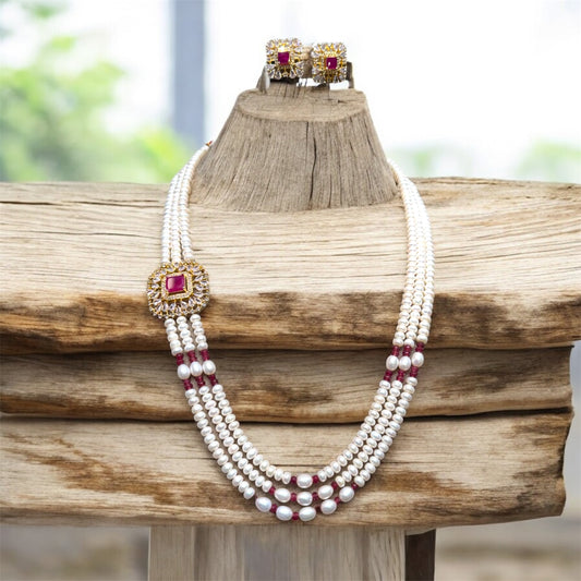 Elegance Redefined: Triple-Strand Real Pearl Set with Side Locket