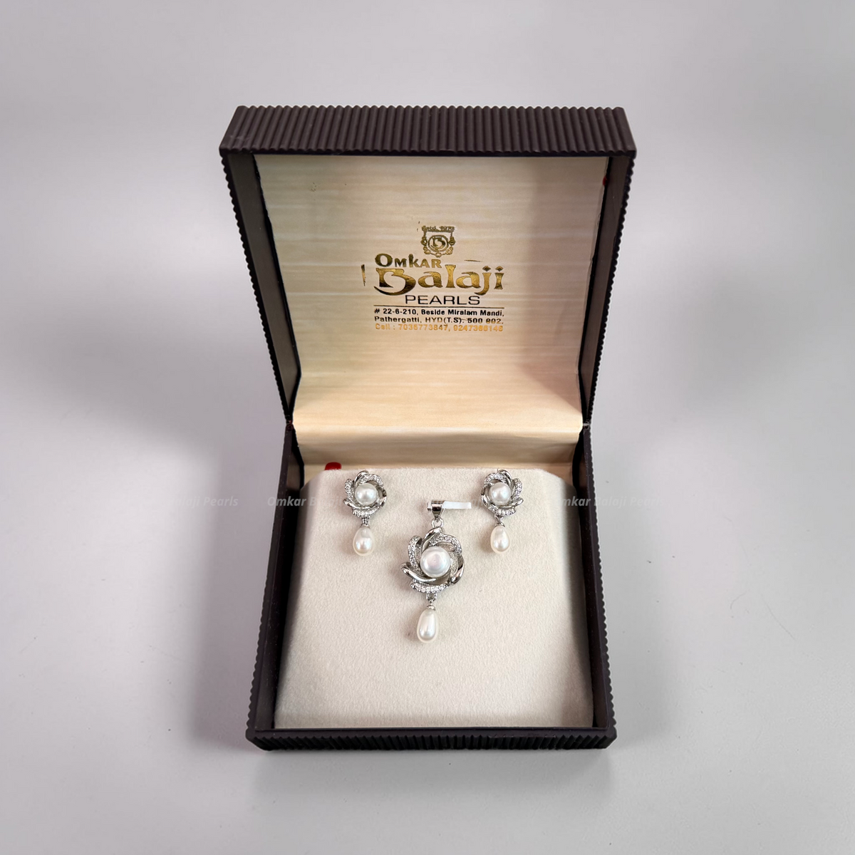 Silver Finish Locket & earrings