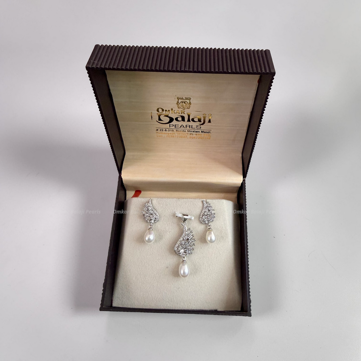 Silver Finish Locket & earrings