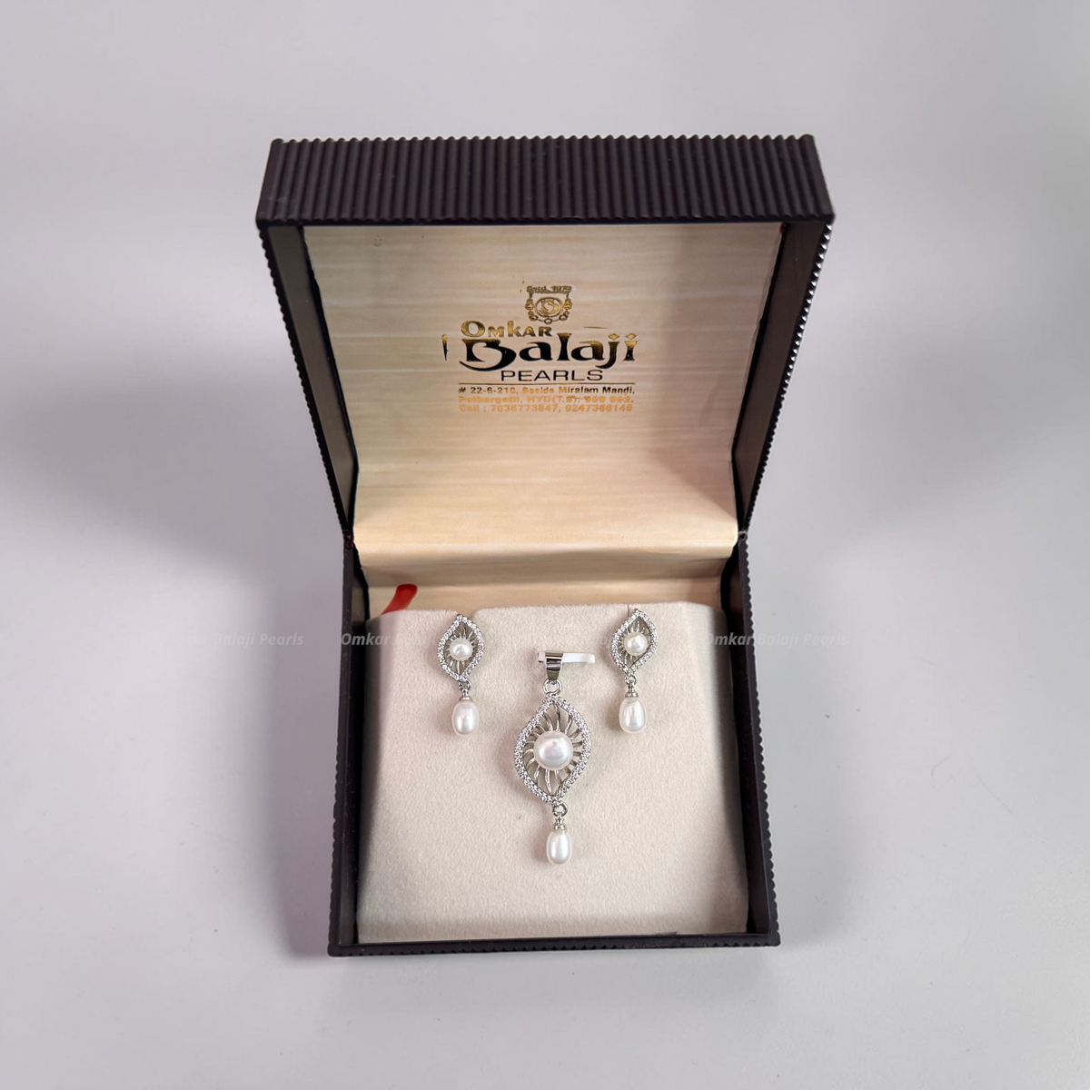 Silver Finish Locket & earrings