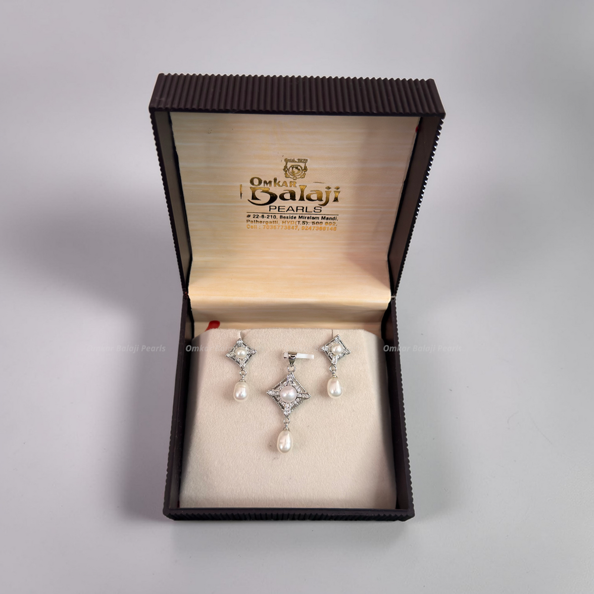 Silver Finish Locket & earrings